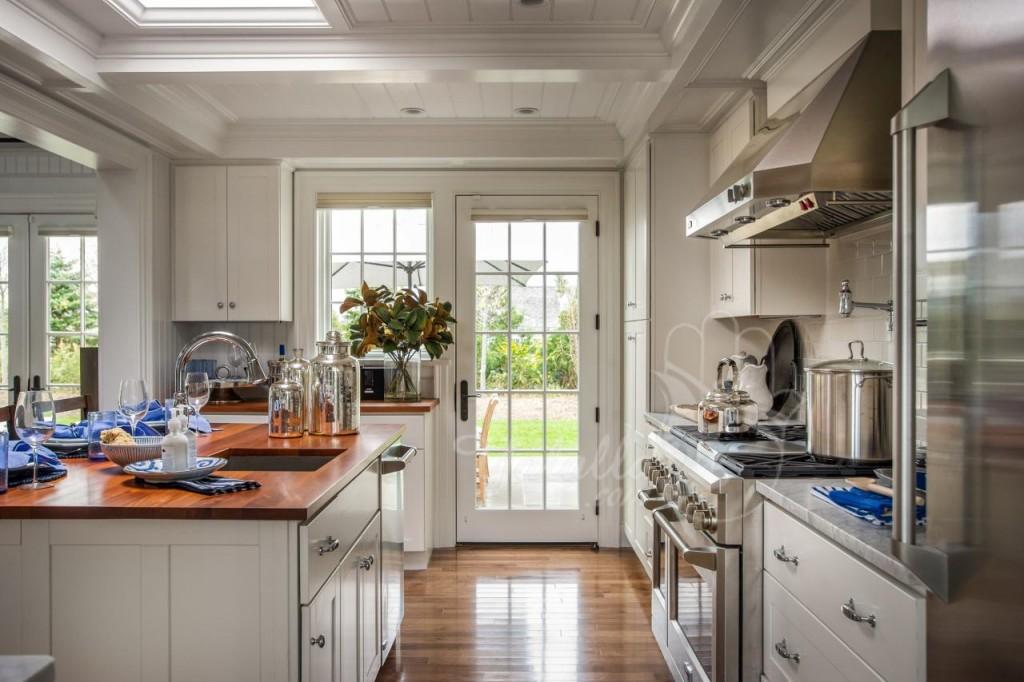 kitchens-2015-inspirations-with-bright-white-kitchen-a-pair-of-french-doors-leads-to-a-lovely-patio
