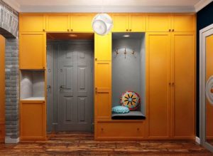 بالصور...تصاميم خزانات ذكية حول باب الشقة لاستغلال المساحة الضيقة